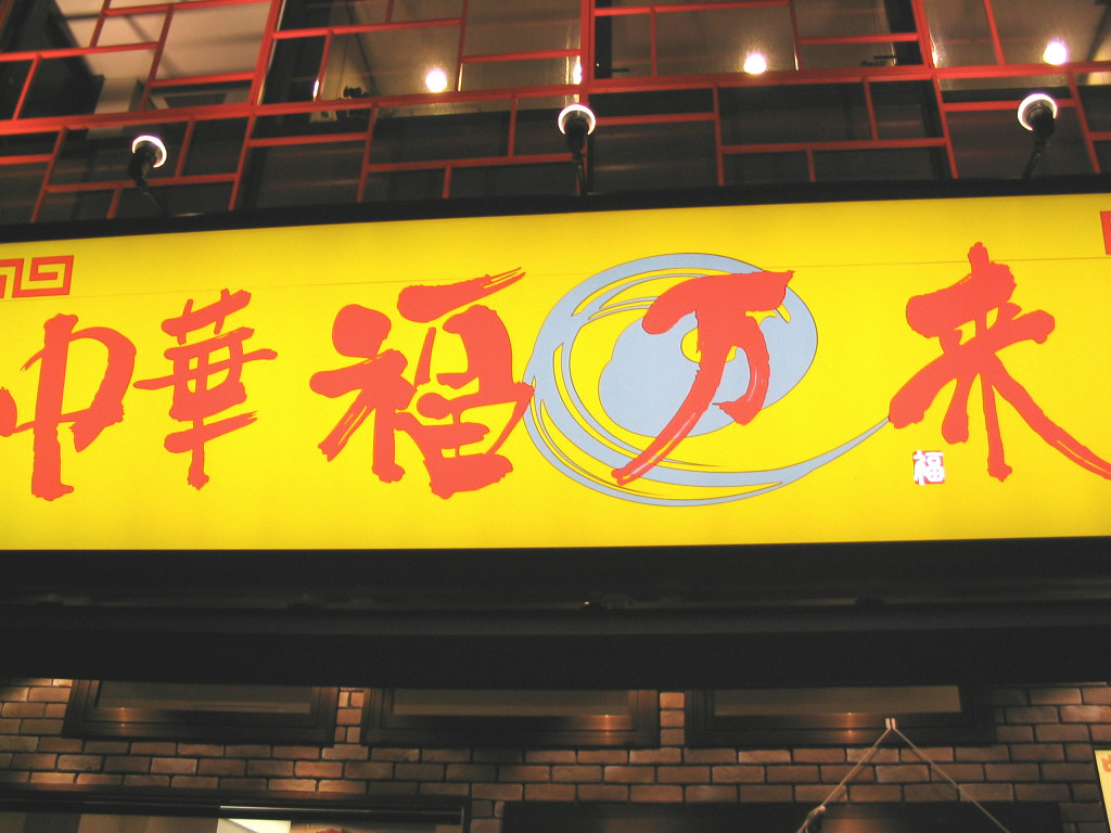 ΂